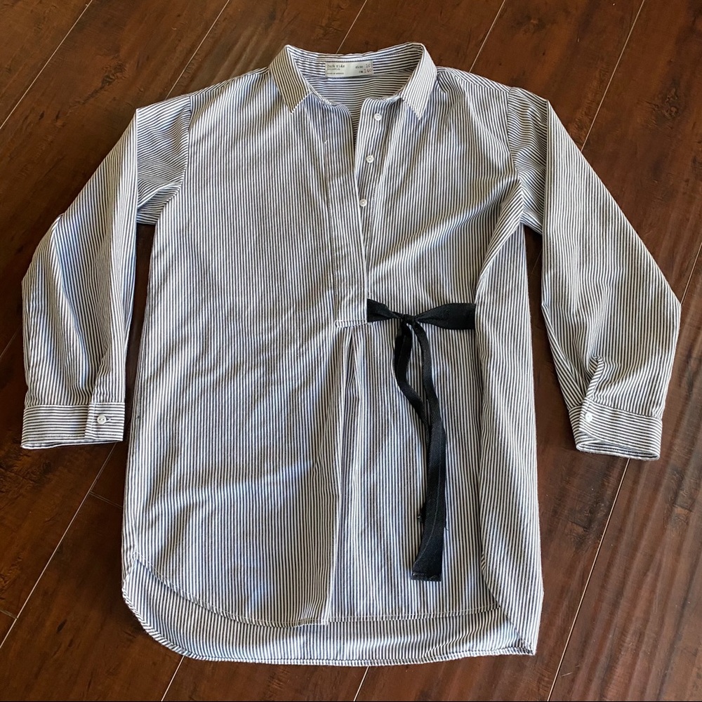 Striped shirt with a black tie